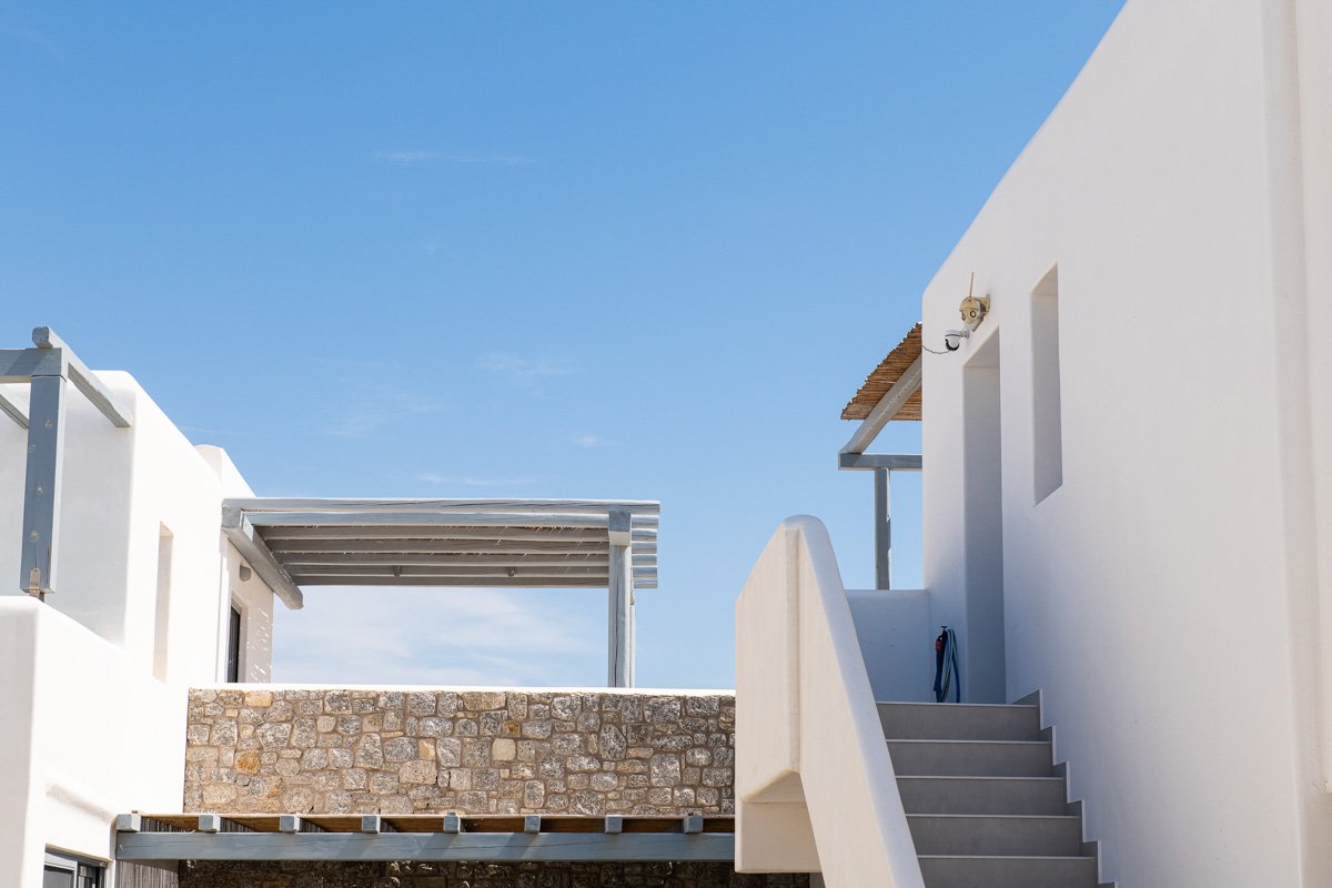 Private Pool Home White and Blue Exterior