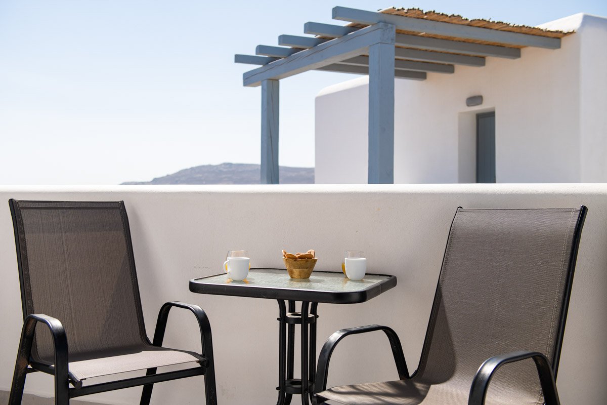 Coffee on the baclony table of One-Bedroom Flat