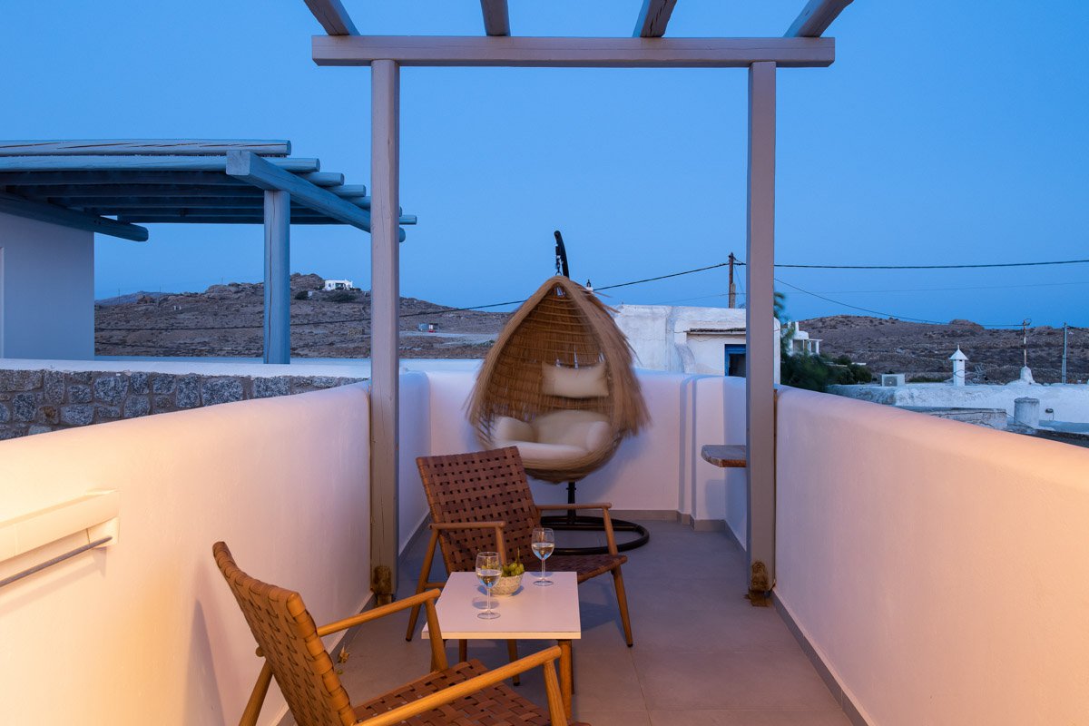 Table and Chairs on the Balcony of One-Bedroom Flat