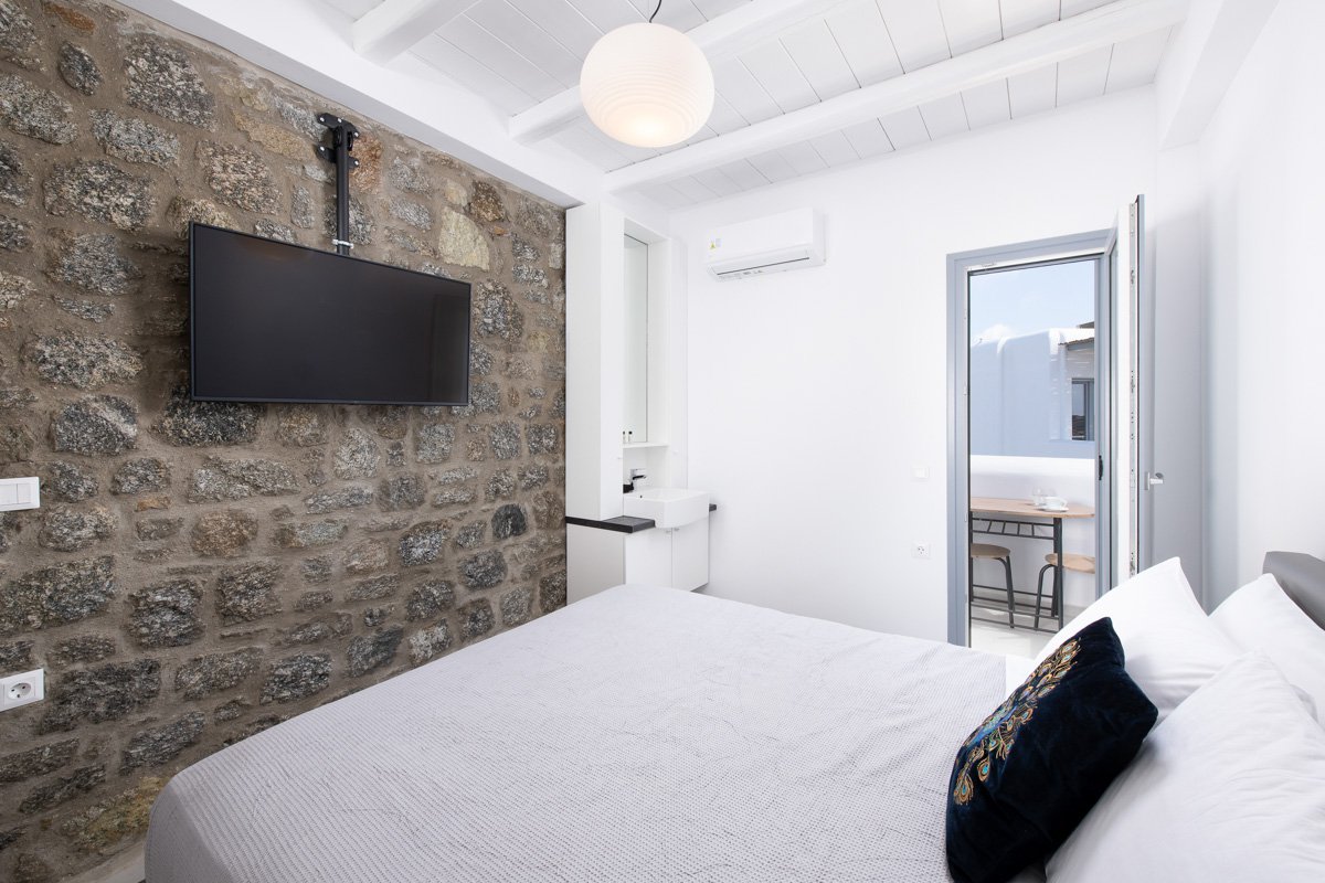 Bed and TV in Private Pool Home