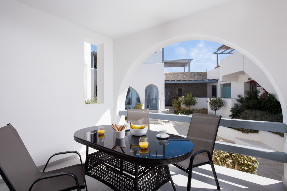 Breakfast table on the balcony of Private Pool Home